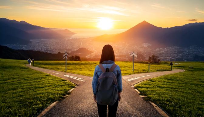 女性の人生の選択肢を表した画像。女性の歩く道が分岐している。